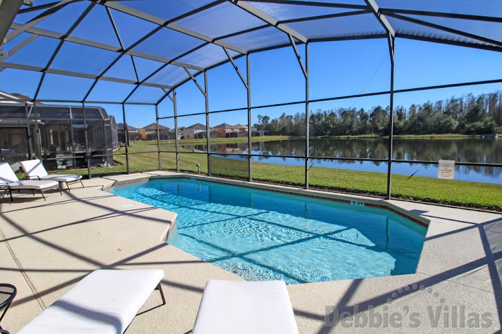 Terra Verde vacation villa in Kissimmee with a lake view from the south-facing private pool