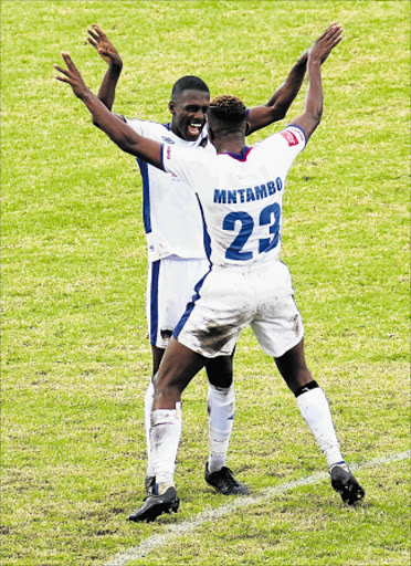 JOB WELL DONE: Abel Mabaso celebrates with Linda Mntambo after scoring the only goal of the match between Chippa United and Free State Stars at the Sisa Dukashe Stadium in Mdantsane on Saturday. Picture: MICHAEL PINYANA