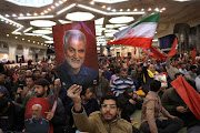 People attend a ceremony to mark the fourth anniversary of the killing of senior Iranian military commander General Qassem Soleimani in a US attack, in Tehran, Iran, on January 3 2024. 