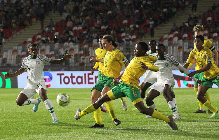 South Africa's Xhosa Manyana attempts to clear the ball during the 2023 U17 African Cup of Nations match against Nigeria at the Mohamed Hamlaoui Stadium in Constantine, Algeria on 06 May 2023.