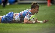 Handre Pollard of the Vodacom Bulls scores a try during the Super Rugby, #SuperHeroSunday match between DHL Stormers and Vodacom Bulls at Cape Town Stadium on February 03, 2019 in Cape Town, South Africa. 