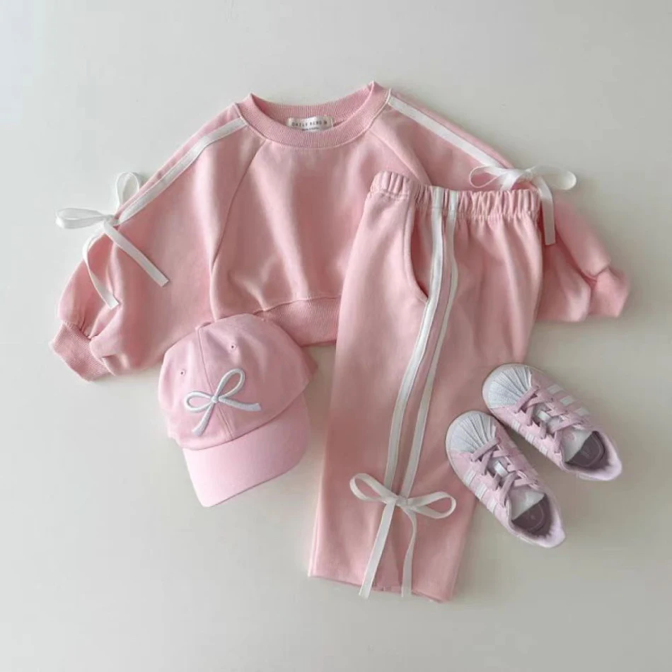 Ensemble pull patchwork nœud bébé, style occidental polyvalent, parfait pour toutes les occasions, confort et élégance pour votre bébé.