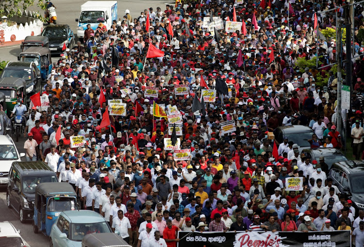 Members and supporters of Sri Lanka's opposition the National People's Power Party march towards Colombo from Beruwala, during a protest against Sri Lankan President Gotabaya Rajapaksa, amid the country's economic crisis, in Colombo, Sri Lanka April 19 2022. Picture: REUTERS/NAVESH CHITRAKAR