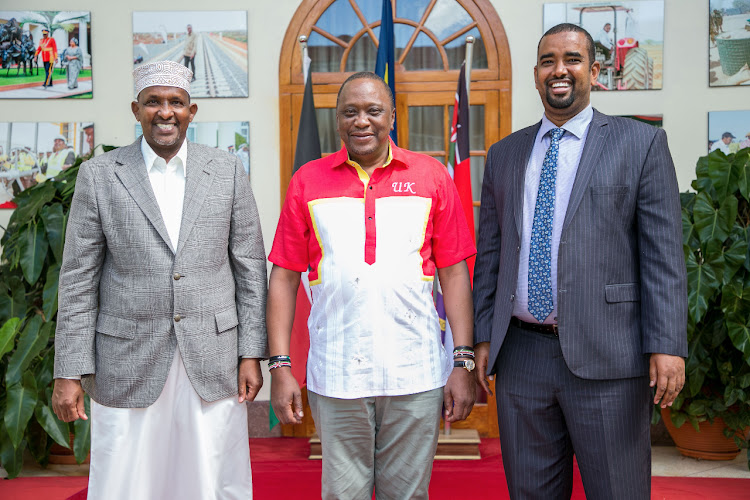 National Assembly Majority Leader Aden Duale, President Uhuru Kenyatta and Wajir West MP candidate Ahmed Kolosh