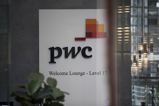 Signage at the lobby of PwC Australia’s office in Sydney, Australia. Picture: BRENT LEWIN/BLOOMBERG.