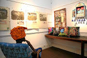  'Dr Shezi' admires his work, which is on show at the Phansi museum in Glenwood, Durban. 