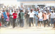 VOLATILE: Moutse residents chant slogans against incorporation into Limpopo. Pic. Kopano Tlape. © Sowetan.