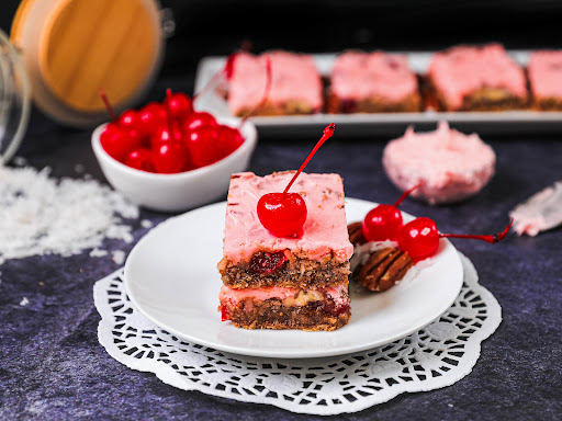 Two Cherry Chews on a plate.