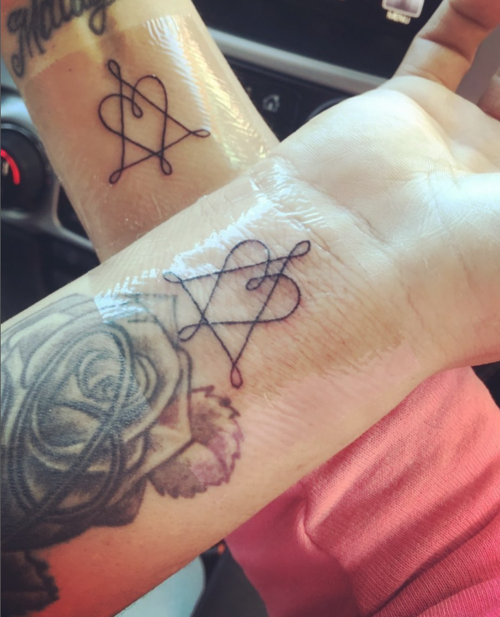 adoption symbol tattoo