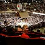 enjoying the fights at the Ryogoku Kokugikan sumo ring in Tokyo in Tokyo, Japan 