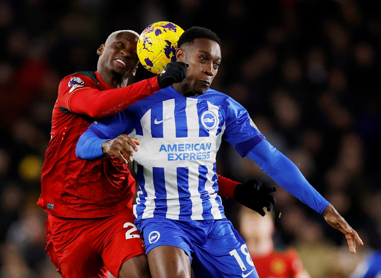 Wolverhampton Wanderers' Toti defends against Brighton and Hove Albion's Danny Welbeck in the Premier League match at The American Express Community Stadium, Brighton on January 22, 2024