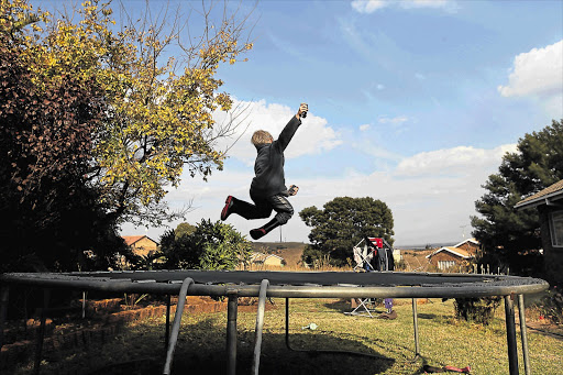 A youngster takes to the town trampoline