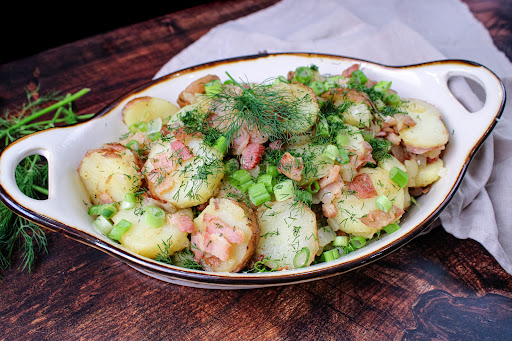 German Potato Salad With Dill in a serving bowl.