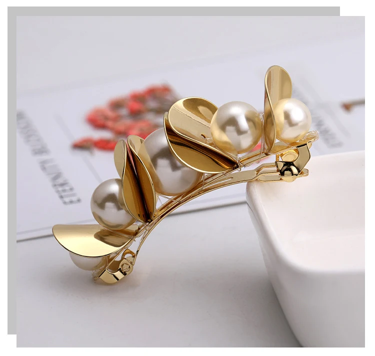 Grampo de cabelo Temperamento Wild Pearl. Elegância selvagem com pérolas. Ideal para penteados sofisticados e um toque de glamour ousado.