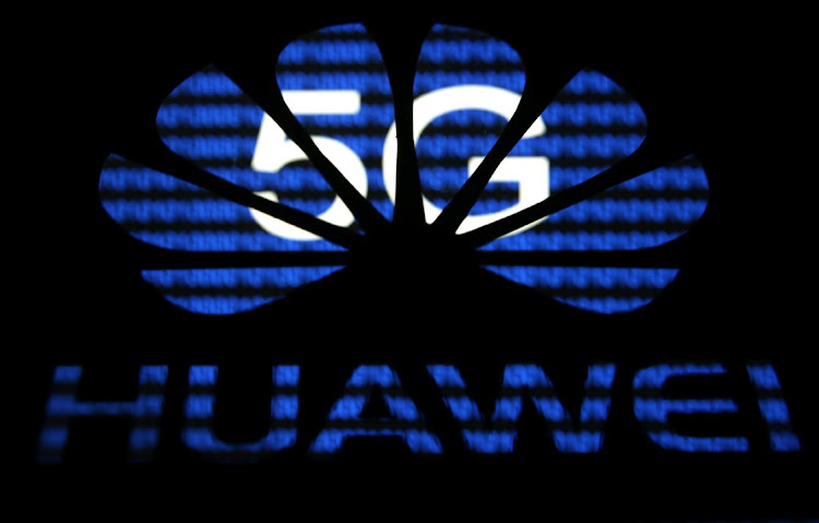 A 3-D printed Huawei logo is seen in front of displayed 5G words in this illustration taken on February 12, 2019. Picture: REUTERS/DADO RUVIC