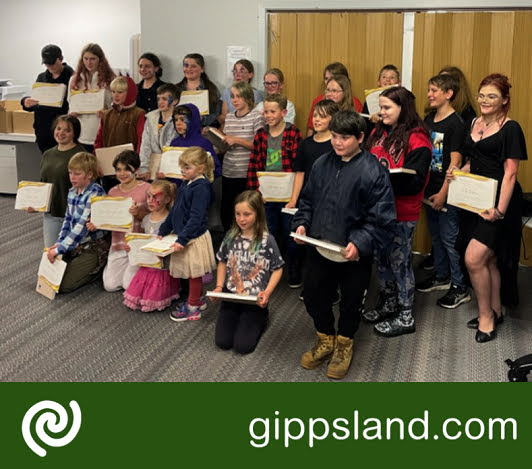 Some of the Sarsfield Snaps participants display the project book and certificates