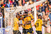 Black Leopards players celebrate with Mwape Musonda after scoring an equalizer during the Absa Premiership match against Highlands Park at Makhulong Stadium on August 09, 2018 in Johannesburg, South Africa. 