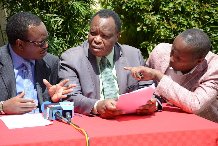 Nyandarua politcians Simon Kanyingi, former Nyandarua deputy governor Waithaka Mwangi and youth leader Macharia Mukua in Naivasha