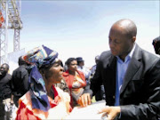 LUCKY: Limpopo MEC for health and social development Seaparo Sekoati gives away food parcels to villagers of Botlokwa at the World Food Day celebrations at the Mokomene Stadium on Friday. Pic. Moyahabo Mabeba. 11/10/2008. ©  Sowetan