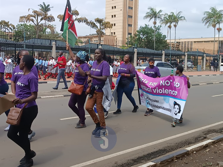 Members of the Brave Movement get ready to start a peaceful march in Nairobi to mark the World Day for Prevention, Healing and Justice to end Childhood Sexual Violence on November 18, 2022.