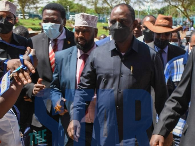 CSs Eugene Wamalwa (Defence) and Ukur Yatani (Treasury) make their way inside Kasarani Stadium ahead of the Azimio La Umoja event on December 10.