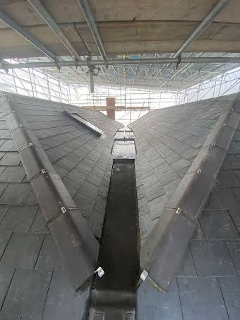 Complete re roof in Natural slate album cover