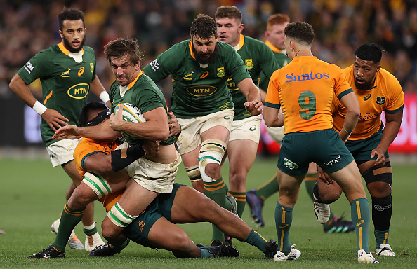 Eben Etzebeth of the Springboks is tackled during the Rugby Championship match against Australia at Allianz Stadium on September 03, 2022 in Sydney, Australia.