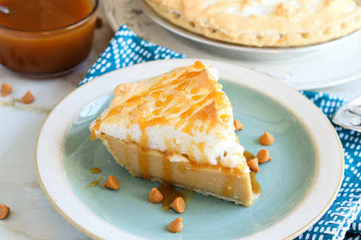 A slice of Butterscotch Pie on a plate.