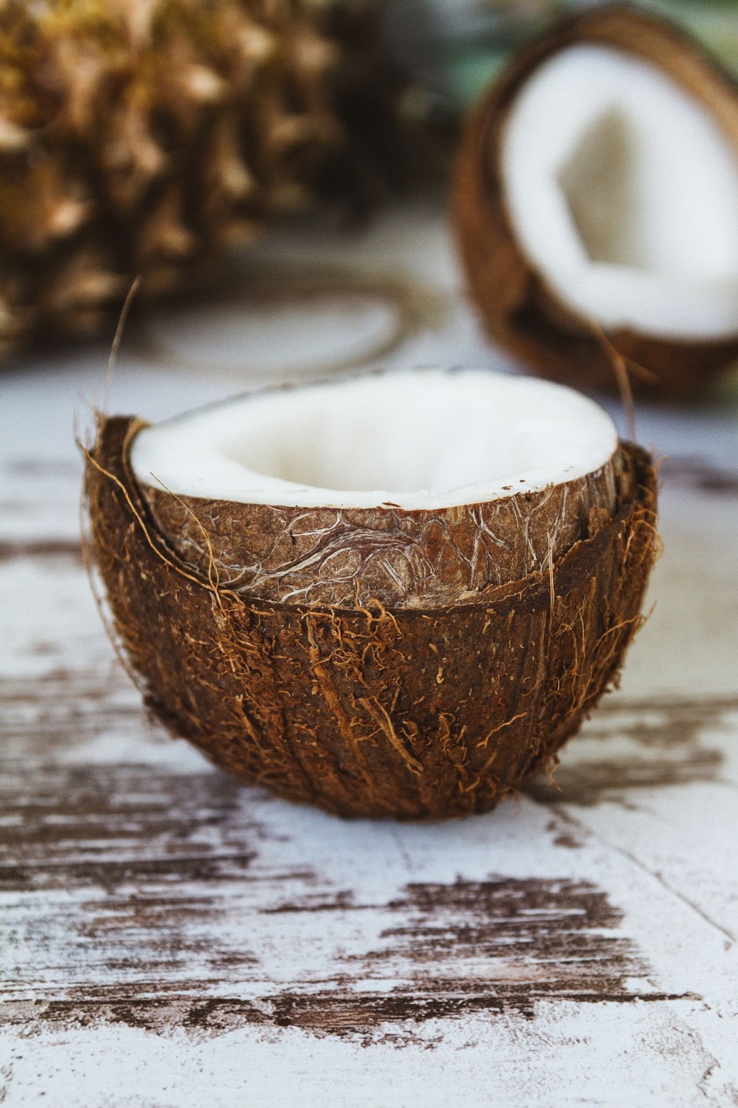 Halved coconuts. Coconut sugar and coconut allergies.