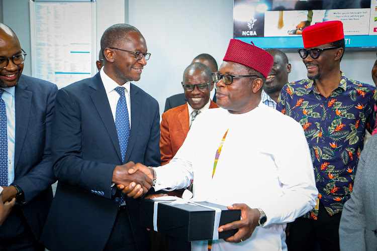 NCBA Group Executive Director David Abwoga with Bungoma Governor Kenneth Lusaka and Kimilili MP Didmus Barasa during the official launch on Chwele NCBA Bank branch on June 6,2023.