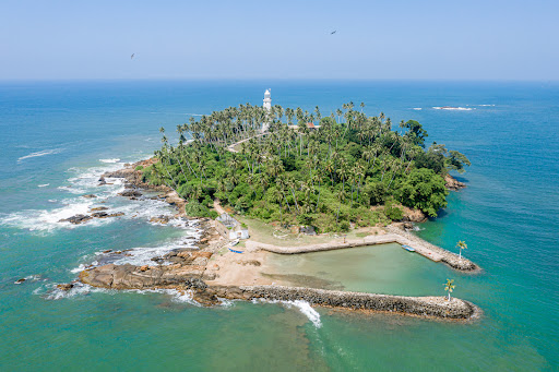 Property purchase in Gammaduwa (Sri Lanka) - Tropical island with lighthouse and palm trees