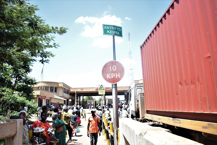 Kenyans and Ugandans going about their business at the Malaba border.