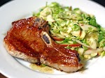 Pork Chops with Shaved Brussels Sprouts and Apple Salad was pinched from <a href="http://www.seriouseats.com/recipes/2013/04/grilled-pork-chop-brussels-apple-salad-recipe.html" target="_blank">www.seriouseats.com.</a>