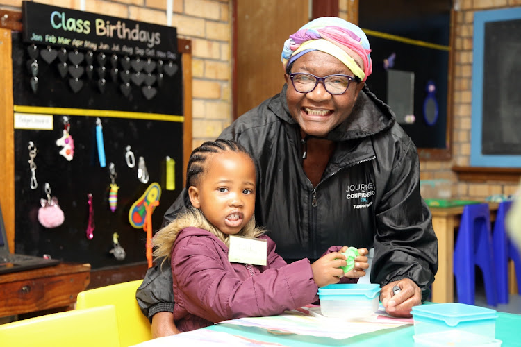 Thalitha Giba with her granny, Lali, ready to start grade RR at Cambridge Primary School, East London.