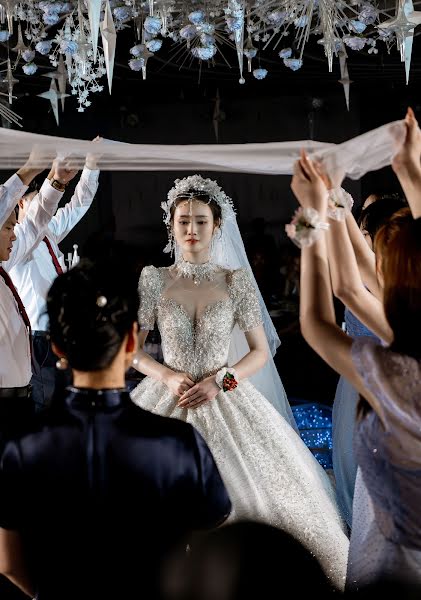 婚禮攝影師Zhenhua Li（onevision）。2023 7月3日的照片
