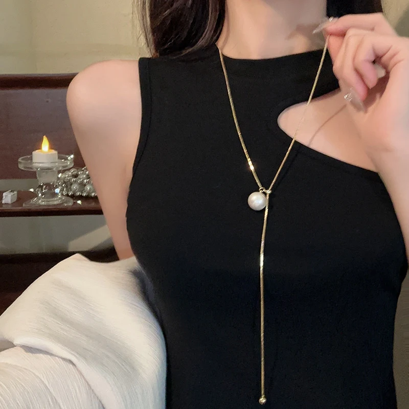 Collier long perles femme en acier titane, réglable, ne ternit pas, design extractible, élégant et durable.
