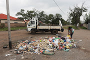 Waste removal services in a number of areas in Ekurhuleni were affected. Some residents dumped their waste in open fields. File photo.