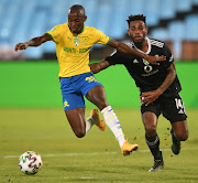 Peter Shalulile of Mamelodi Sundowns challenged by Thulani Hlatshwayo of Orlando Pirates during the 2021 Nedbank Cup Quarterfinal match between Mamelodi Sundowns and Orlando Pirates on the 15 April 2021 at Loftus Versfeld Stadium.