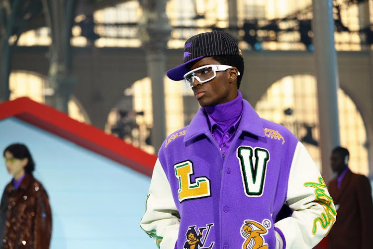 A model presents a creation by late designer Virgil Abloh as part of his Fall/Winter 2022 collection show for Louis Vuitton during Men's Fashion Week in Paris. REUTERS/Violeta Santos Moura