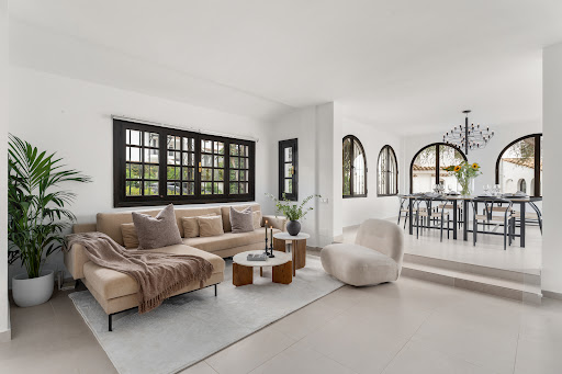 Bright living room with sectional sofa and dining area in this luxury apartment / penthouse for sale in Marbella ($1,382,758 - 169 m²)