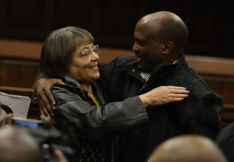 Patricia de Lille celebrates the outcome of the judgment with former member of PAC Gilbert April at the Western Cape High Court