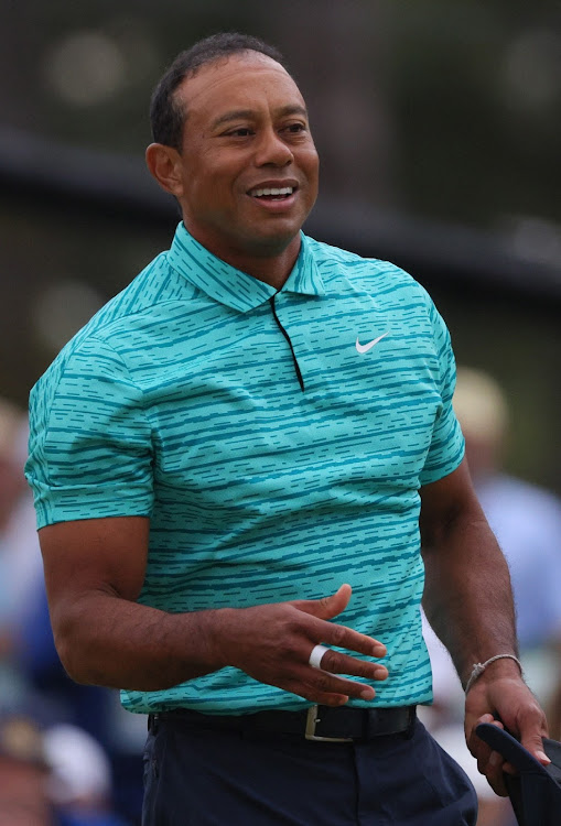 Tiger Woods on the 18th green after finishing the second round of the 2022 Masters.