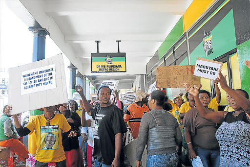 DISGRUNTLED: ANC members protest outside the ANC’s Dr WB Rubusane offices yesterday calling for Jesse Duarte to come and listen to their grievances and concerns Picture: SIBONGILE NGALWA