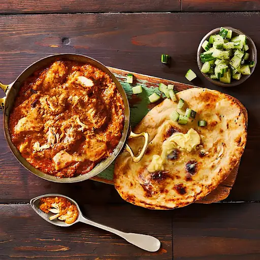 Chicken Curry (2pc) + Aloo Bhujiya + Ghughni + 8 Tawa Paratha