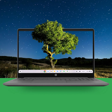 Chromebook over a landscape background simulating it coming out of the screen