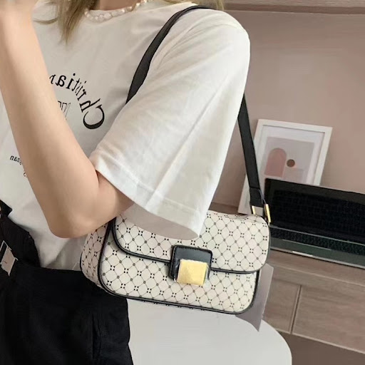 Title 1, Womens printed geometric shoulder bag. A styli...