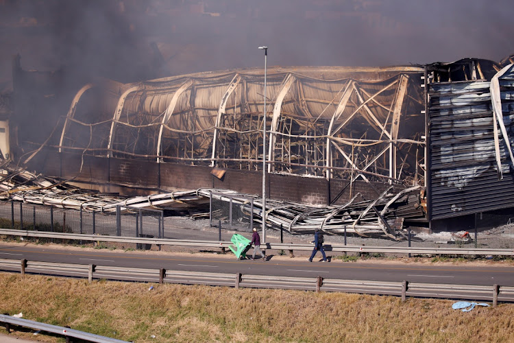 Brookside Mall in Pietermaritzburg burns after being looted, July 12 2021. Picture: REUTERS/ROGAN WARD