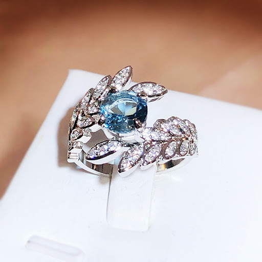 Title 4, Super Peacock Feather Ring Female Opening, a st...