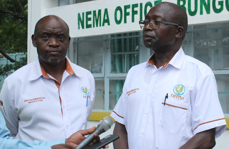 Bungoma county Nema director Vincent Mahiva and Western region Nema director Anthony Aura addressing the press in Bungoma town on May 16.