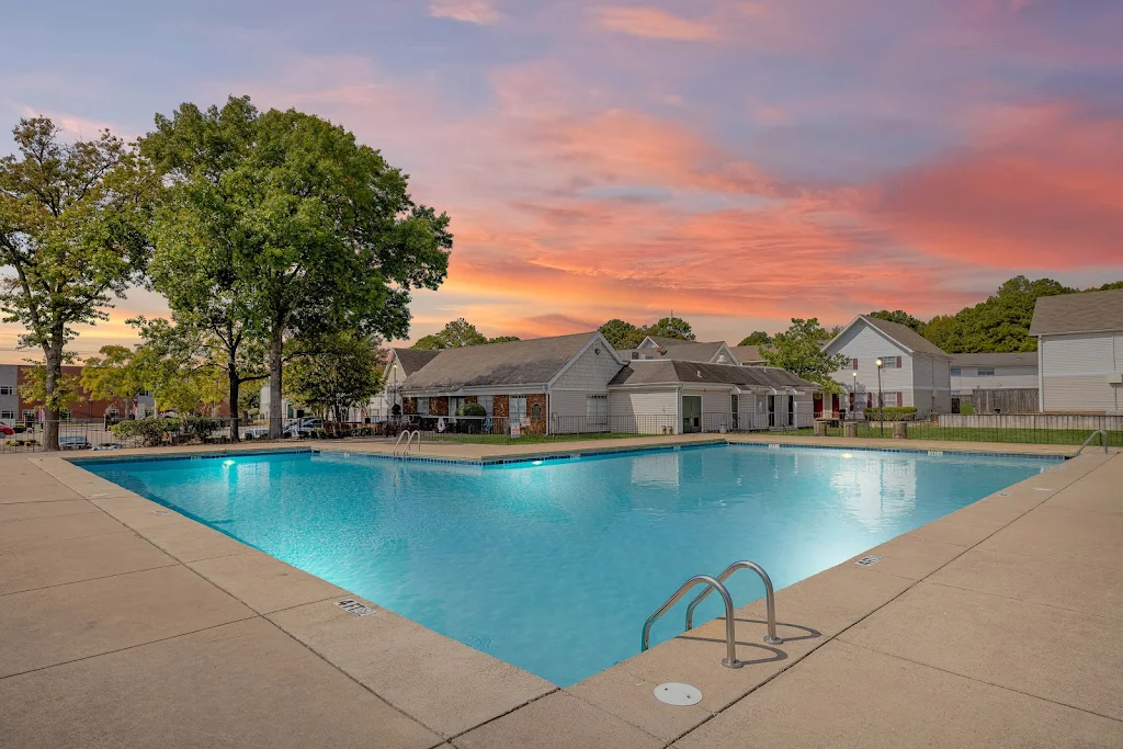 Highland Chateau's community pool at dusk